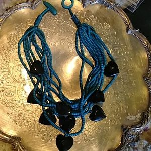 Native treasure hand carved beaded multiple strand